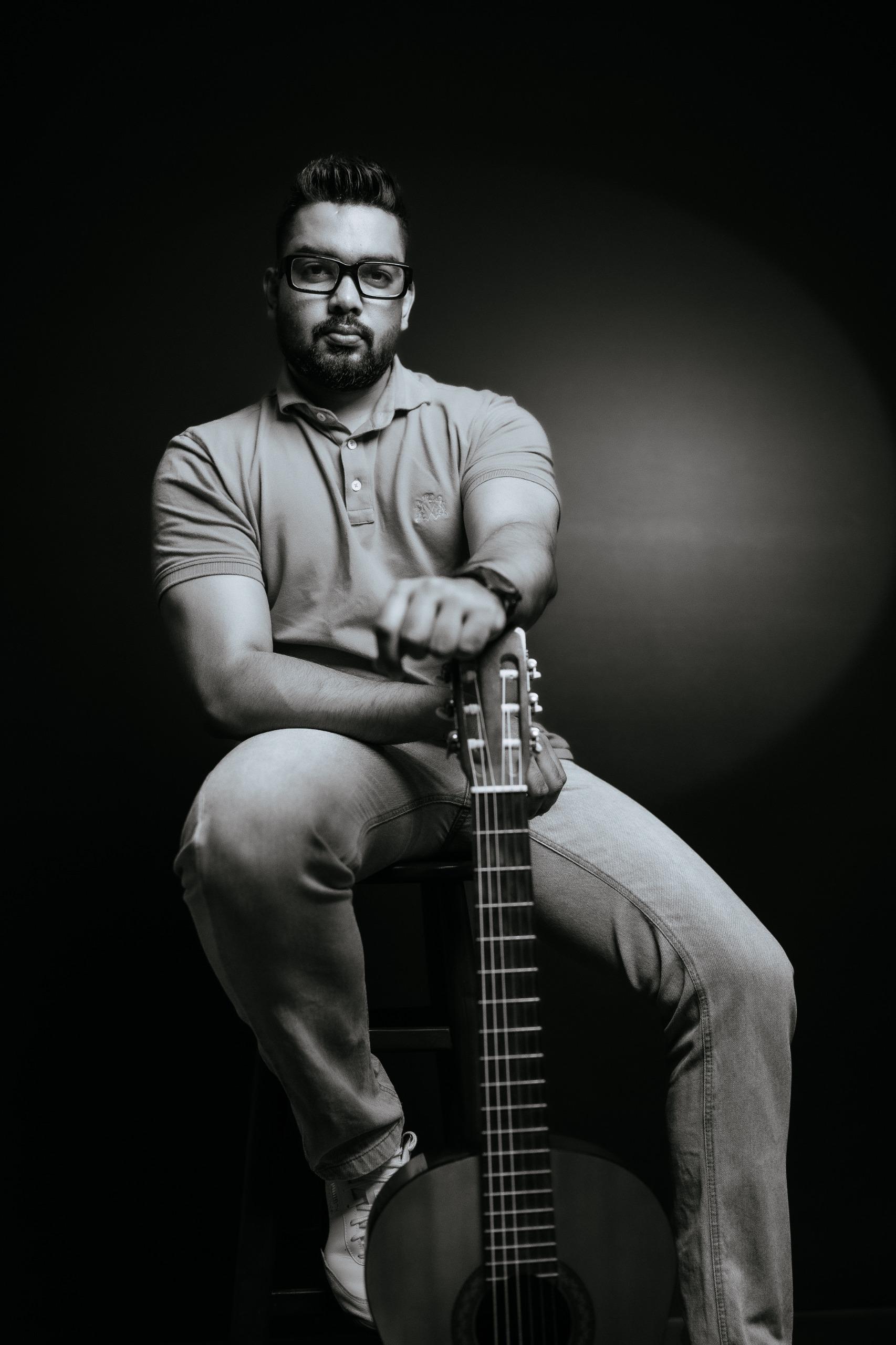 Bhashana Udeepa with acoustic guitar